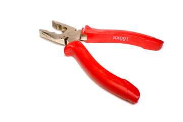 red open pliers lie on a white background. working tool.