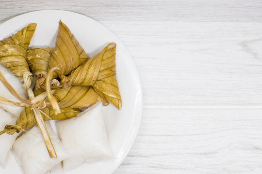 Portion Of Ketupat Palas And Nasi Himpit In Selective Focus. Hari Raya Food.