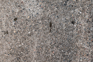 Dark grey stone texture.