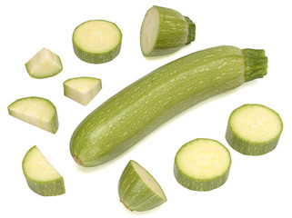 Squash, vegetable marrow, zucchini and its pieces isolated on a white