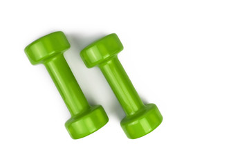 two green dumbbell isolated on a white background, sports equipment, bodybuilding
