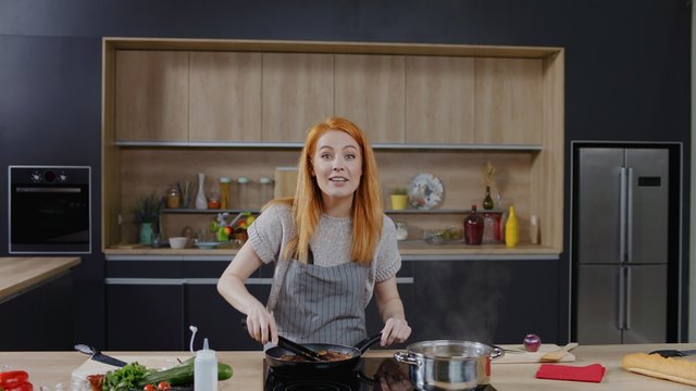 Cooking show hosts celebrity chef shows how to cook meat. Morning TV cooking programme