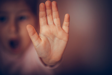 Woman hand sign for stop abusing violence. International human rights or refugee day concept.