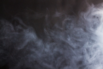 Cigarette smoke on a black background
