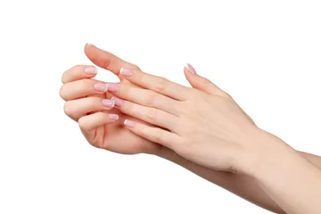 Poster Well-groomed female hands with manicure on white background © fotofabrika