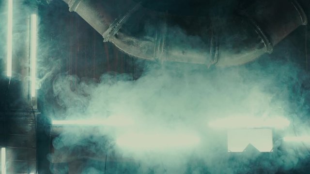 Pipes in the smoke inside the plant
