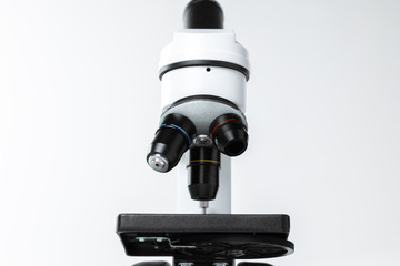 Mo0dern white laboratory microscope on white background