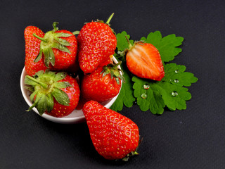 strawberries on a black background