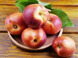 apples on a wooden table
