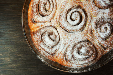 homemade cake. cake with cinnamon and powdered sugar. delicious dessert.