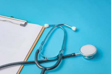 the Medical stethoscope in blue background