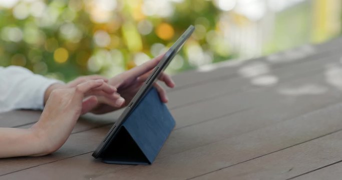 Use of tablet computer at park