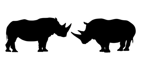 Obraz na płótnie Canvas Set of black and white silhouettes of rhinoceros with two horns - isolated on white background - vector