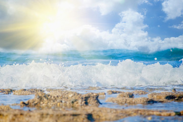 Fantastic view of sea wave crashing on the rock and make a splashing water with bubble.