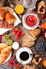 continental breakfast with coffee, tea, croissant and fresh fruit