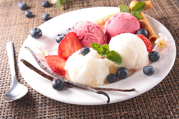 ice cream with blueberry and strawberry