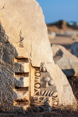 Ancient ruins in Side, fragments of carved marble