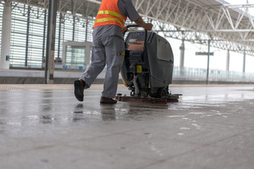 cleaning floor with machine