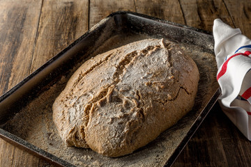 homemade handmade bread on wooden background