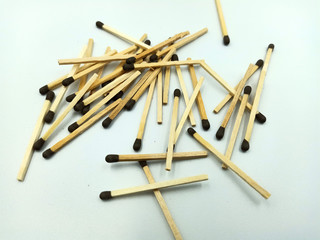 Match sticks with black heads in a row