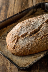 homemade handmade bread on wooden background