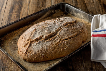 homemade handmade bread on wooden background