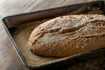 homemade handmade bread on wooden background