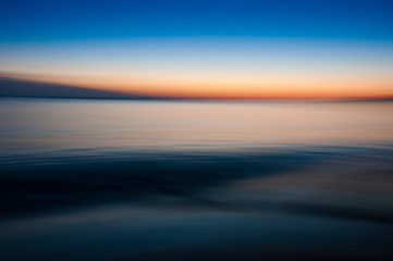 Fototapeta na wymiar Abstract sunset over the sea
