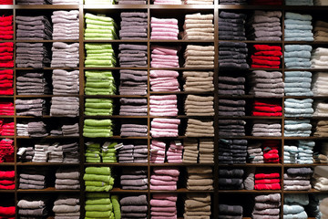 rack of many colored folded towels