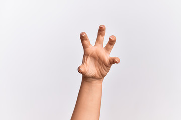 Hand of caucasian young woman grasping aggressive and scary with fingers, violence and frustration