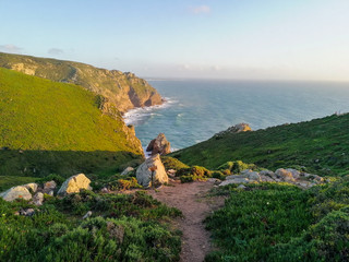 Cabo da Roca or Cape Roca is a cape which forms the westernmost point of the Sintra Mountain Range, of mainland Portugal, of continental Europe, and of the Eurasian land mass
Cabo da Roca, the western