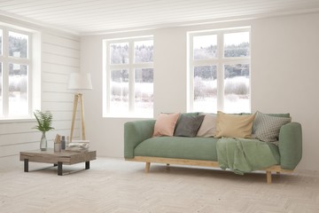 White living room with sofa and winter landscape in window. Scandinavian interior design. 3D illustration