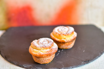 cupcake with cheese stuffing close-up on a plate
