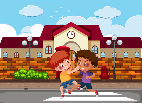 Scene with two boys fighting on the street