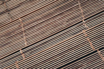 Fototapeta premium Wood and Sawmill. Large round logs harvested for construction.