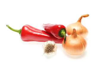 Sweet pepper, onion, tomato and garlic isolated on white background