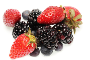Group of fresh berries isolated on white