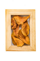 mango dried fruits in a frame for a photo isolate on a white background