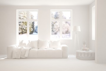 White living room with sofa and winter landscape in window. Scandinavian interior design. 3D illustration