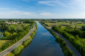 Aerial view of the Dender river, while passing the town of Dendermonde, in Belgium