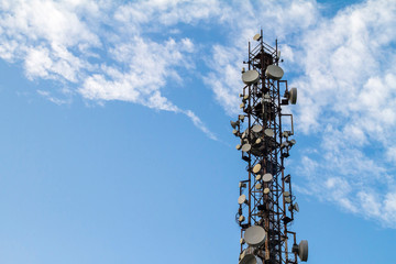 Mobile phone Telecommunication Radio antenna Tower with blue sky. Cell tower.