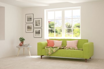 White living room with sofa and summer landscape in window. Scandinavian interior design. 3D illustration