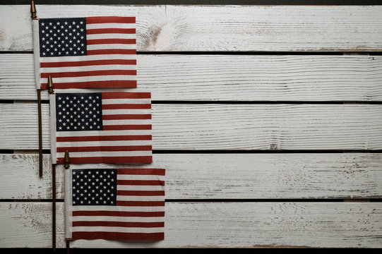 American stars and stripes flat lay over rustic wood background 4th of July memorial day in Americana style