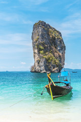 Thai traditional wooden longtail boat and beautiful sand beach at Koh Poda island in Krabi province.  Ao Nang, Thailand ,Krabi island is a most popular tourist destination in Thailand