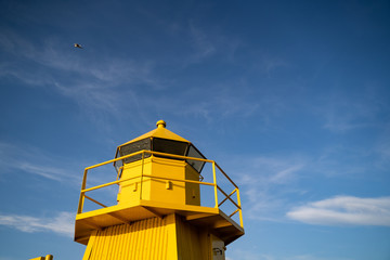 Close up of the little yellow lighthouse in Iceland