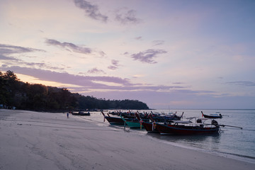 Travel by Thailand. Landscape with traditional longtail fishing boat on the sea beach.