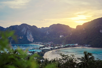 Wonderful sunset on Phi Phi Don island view point. Beautiful landscape with tropical sea lagoon.