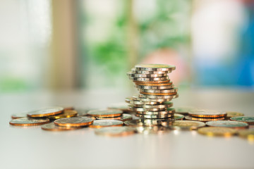 Closeup stack coins on blurry background using as business banking and financial concept
