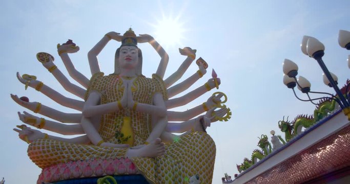 Beautiful Pan of Indian Goddess with the Sun Behind. Imposing Kali Meditates Peacefully, Thailand 4K