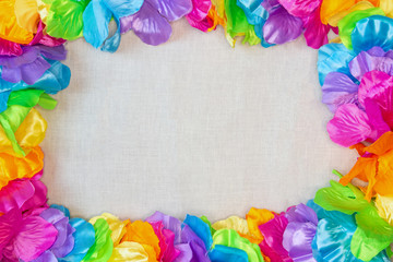 Frame made from flowers of lei. Top view, flat lay, copy space.
